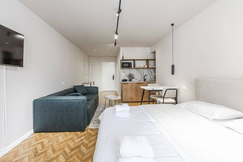 Bedroom area and fully-equipped kitchen