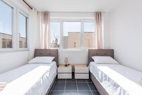 Bedroom 2 with two single beds