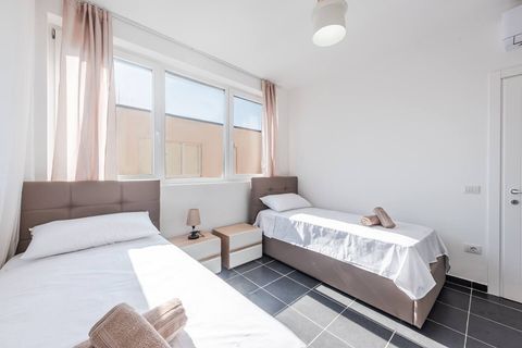 Bedroom 2 with two single beds