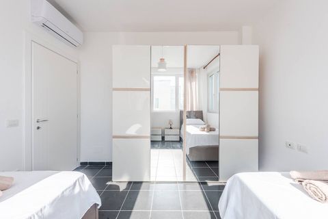 Bedroom 2 with two single beds