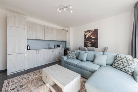 Living room and fully-equipped kitchen