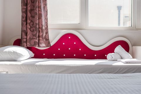 Bedroom with one double bed and a single bed