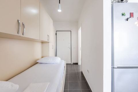 Hallway with a single bed