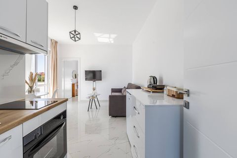 Living room and fully-equipped kitchen