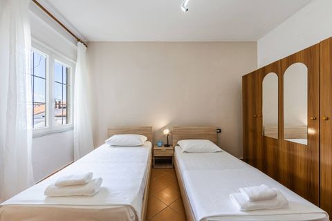 Bedroom 2 with two single beds