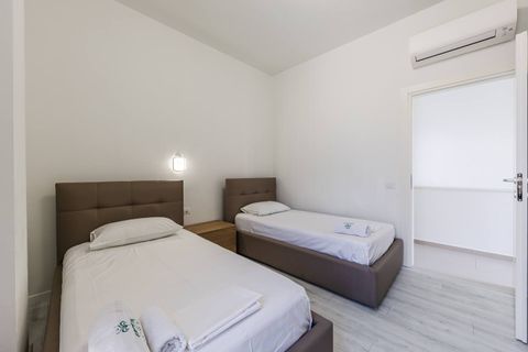 Bedroom 2 with two single beds