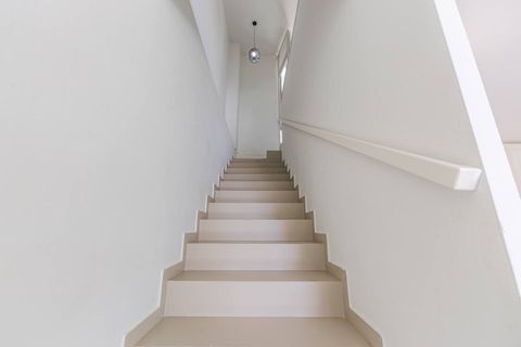 Stairs leading to the first floor