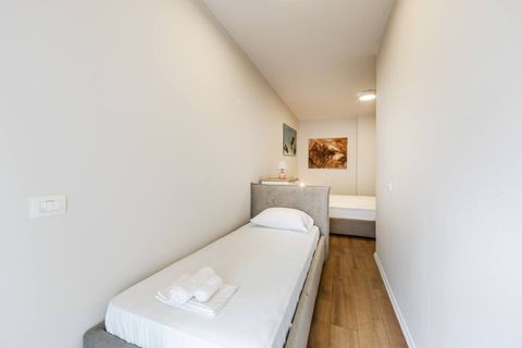 Bedroom with a double bed and a single bed