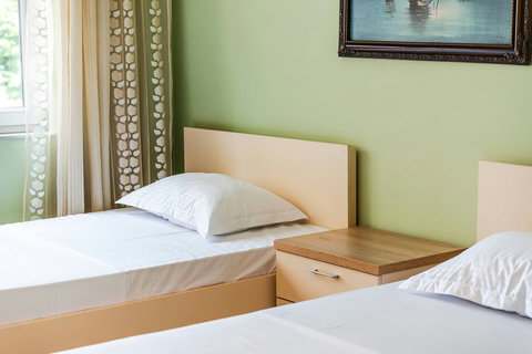 Bedroom 2 with two single beds