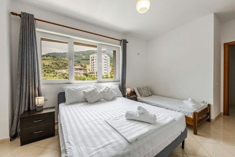 Bedroom with a double and single bed