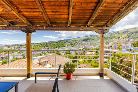 Balcony 1 with seating area (entrance from Bedroom 2)