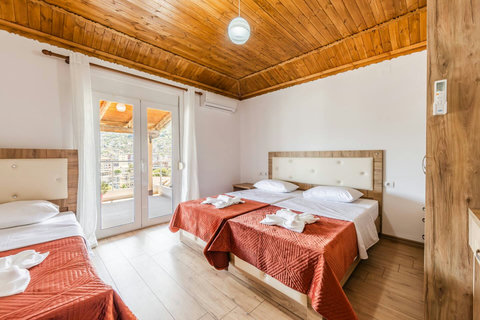 Bedroom 2 with a single bed and a double bed