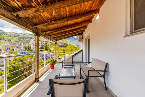 Balcony 1 with seating area (entrance from Bedroom 2)
