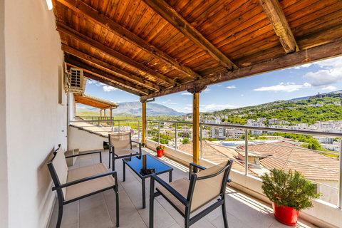 Balcony 1 with seating area (entrance from Bedroom 2)