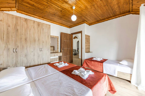 Bedroom 2 with a single bed and a double bed