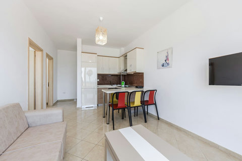 Living room and fully-equipped kitchen