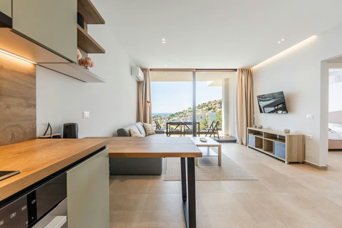 Living room and fully-equipped kitchen