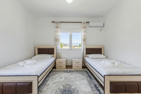 Bedroom 3 with two single beds