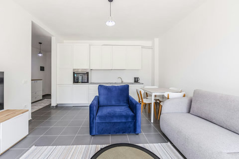 Living room and fully-equipped kitchen