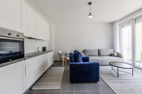 Living room and fully-equipped kitchen