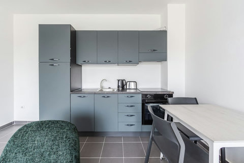 Fully-equipped kitchen and dining area