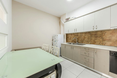 Fully-equipped kitchen and dining area