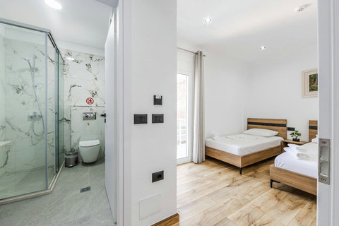 Bedroom with a double and a single bed