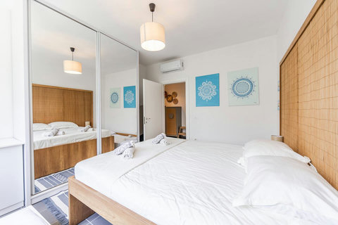 Bedroom with a double and two single beds