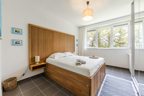 Bedroom with a double and two single beds