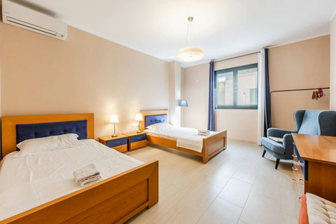 Bedroom 2 with two single beds