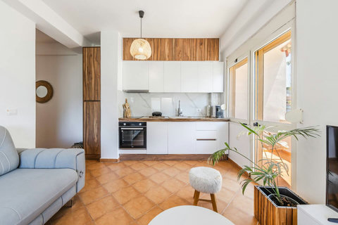 Living room and fully-equipped kitchen