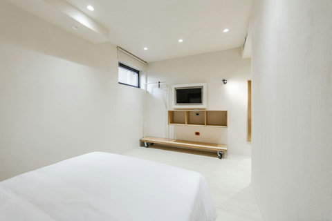 Bedroom 5 with a double bed (ground floor)