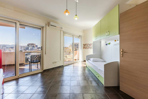 Bedroom 2 with a bunk bed and a single bed