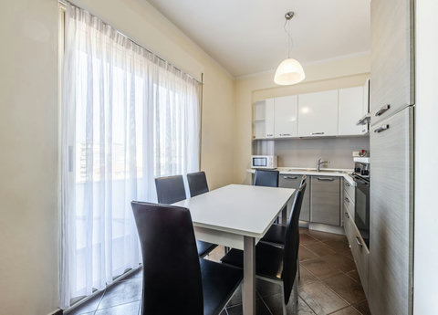 Fully-equipped kitchen and dining area