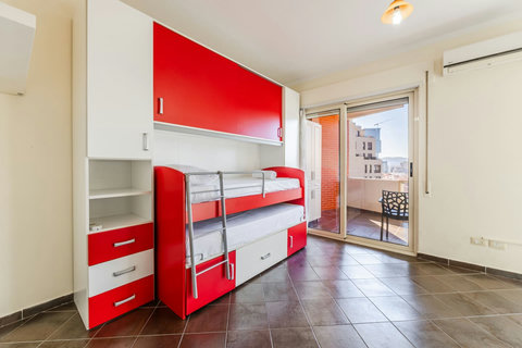 Bedroom 2 with a bunk bed and a single bed