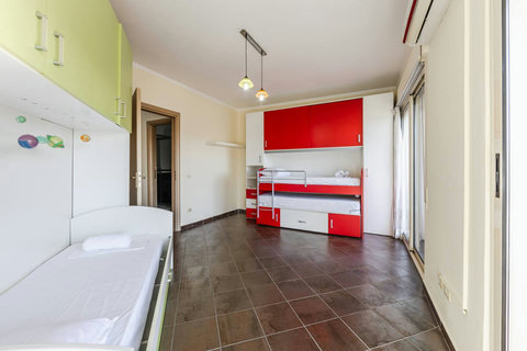 Bedroom 2 with a bunk bed and a single bed