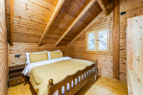 Bedroom 2 located in the first floor with a double bed