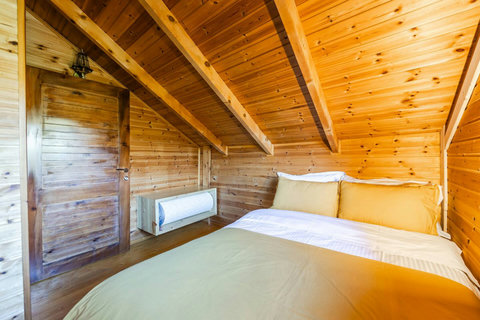 Bedroom 3 located in the first floor with a double bed