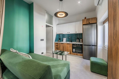 Living room and fully-equipped kitchen