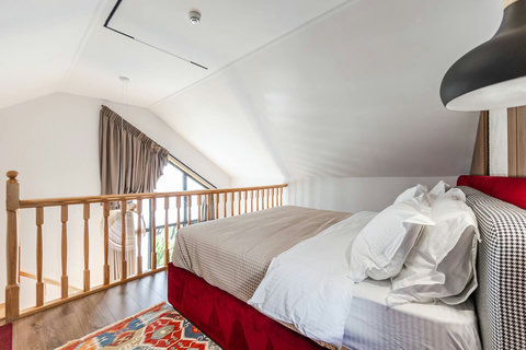 Bedroom located in the first floor with a double bed
