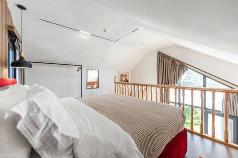 Bedroom located in the first floor with a double bed