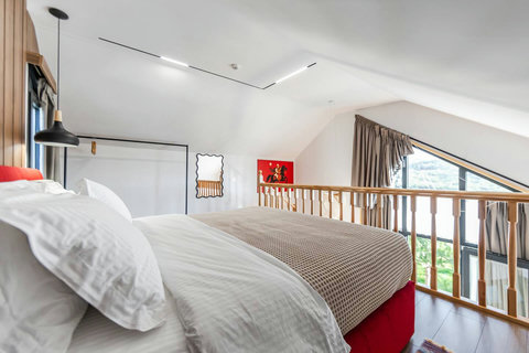 Bedroom located in the first floor with a double bed