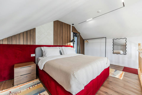 Bedroom located in the first floor with a double bed