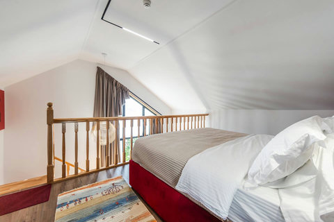 Bedroom located in the first floor with a double bed