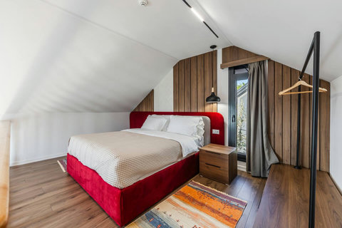 Bedroom located in the first floor with a double bed