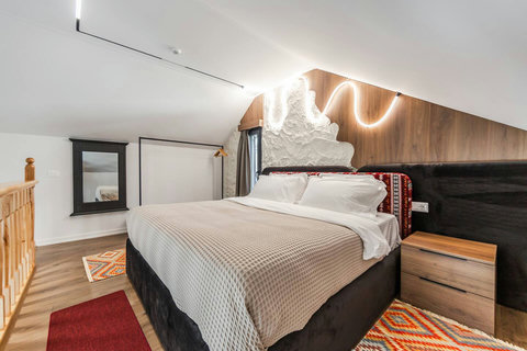 Bedroom located in the first floor with a double bed