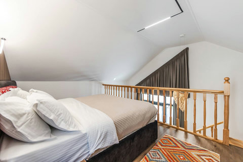 Bedroom located in the first floor with a double bed