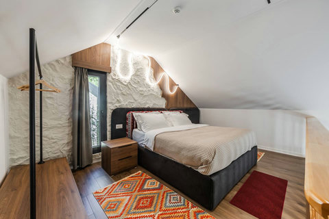 Bedroom located in the first floor with a double bed
