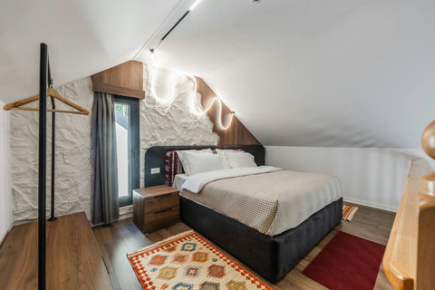 Bedroom located in the first floor with a double bed