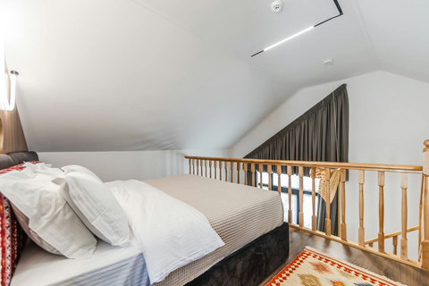 Bedroom located in the first floor with a double bed